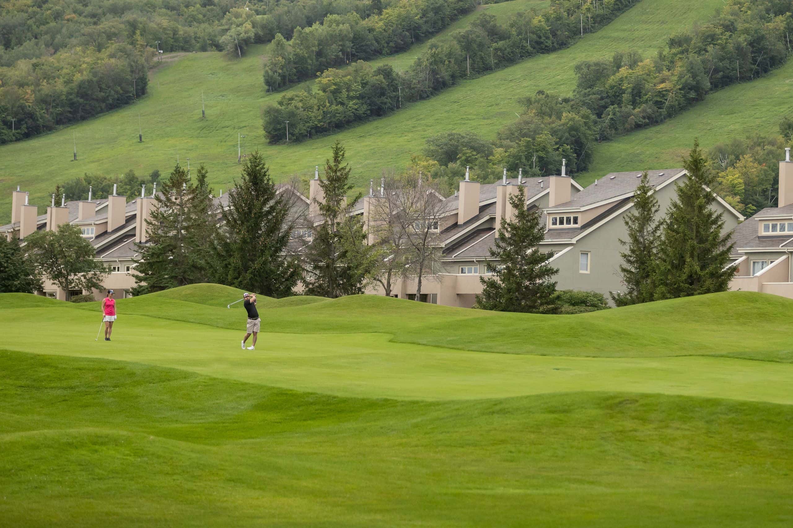 A landscape photo of a group golfing at Monterra. 
